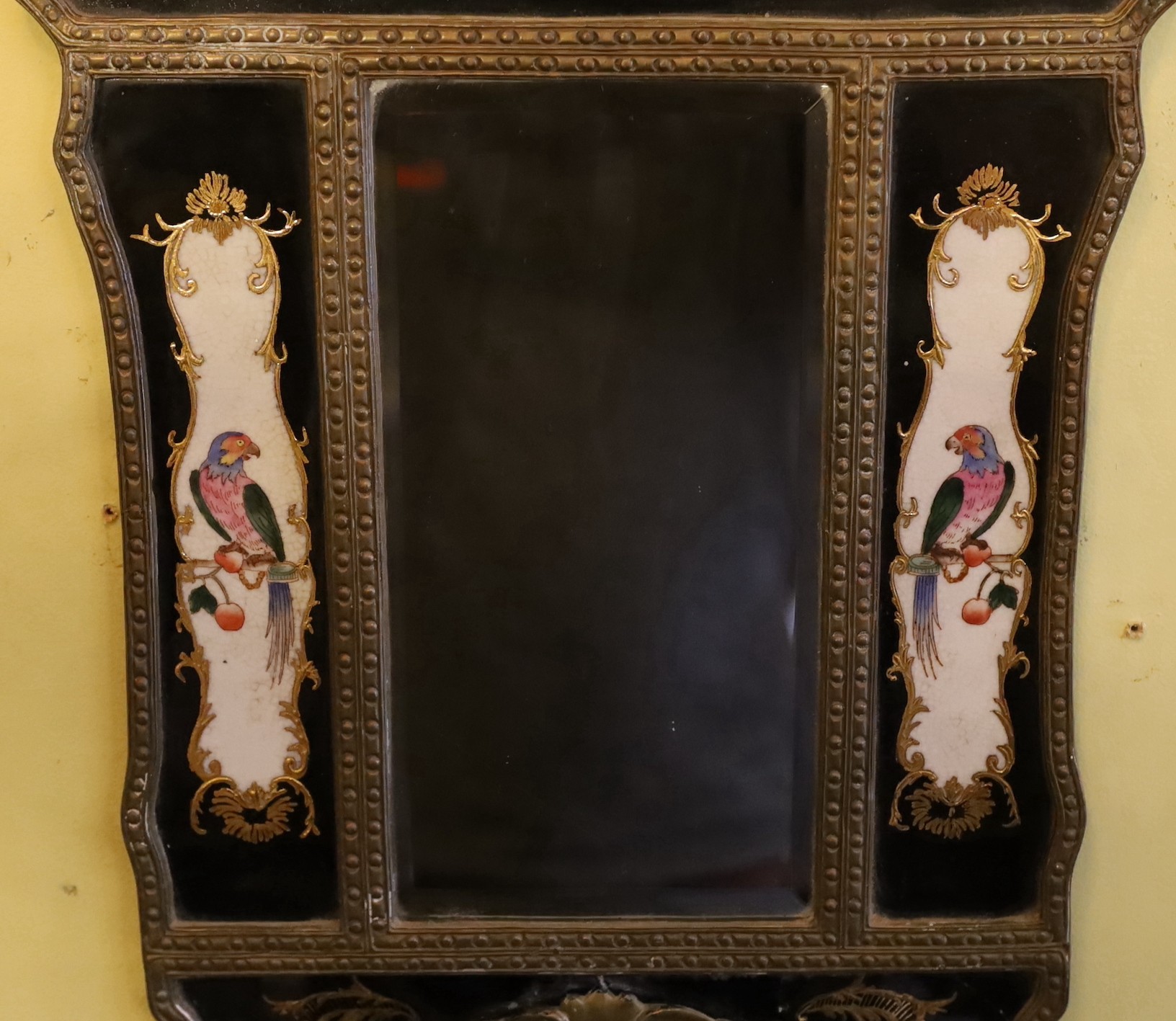 A pair of brass mounted ceramic girandoles in the Louis XIV style, height 64cm. width 38cm
